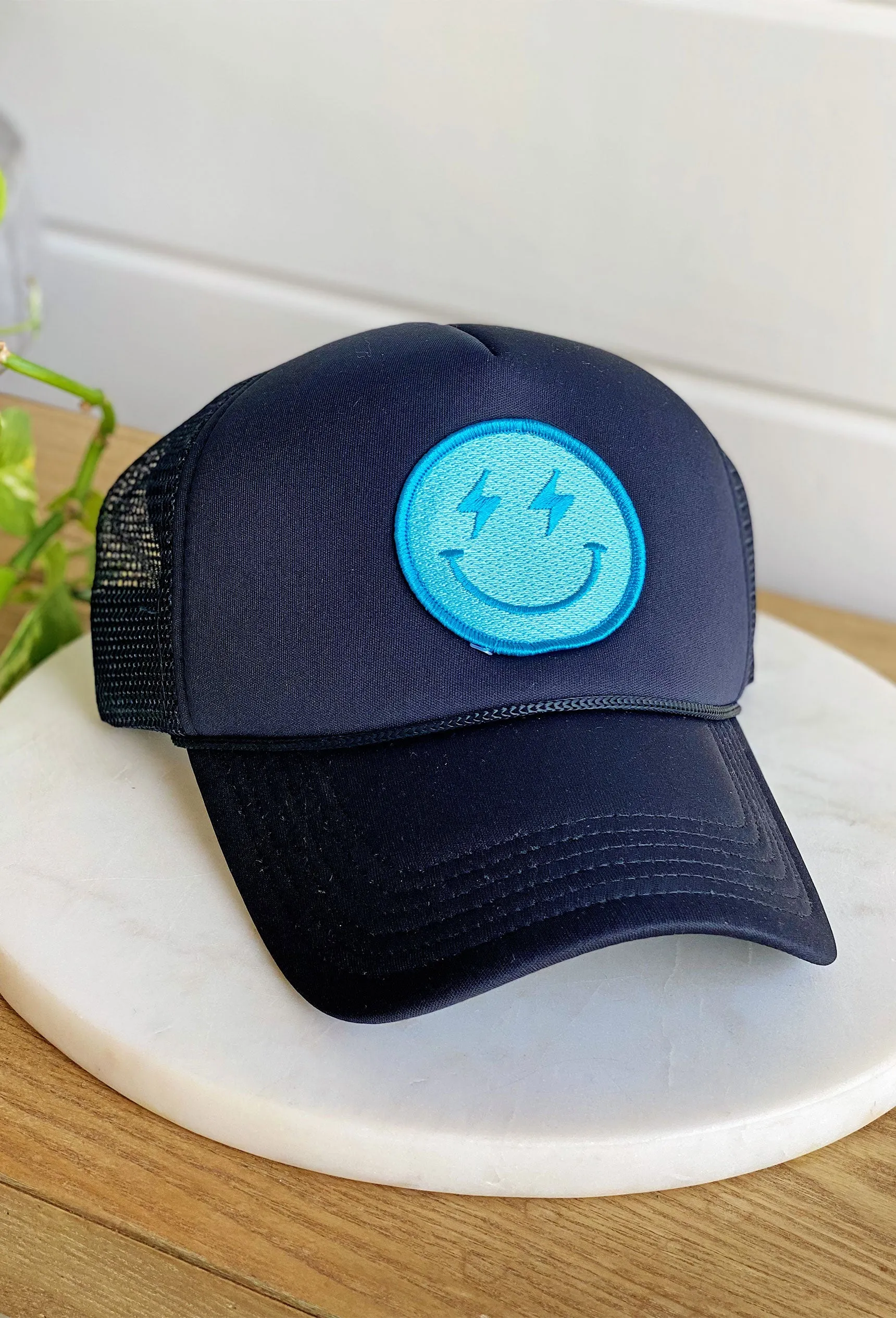 Happy Vibes Trucker Hat in Black